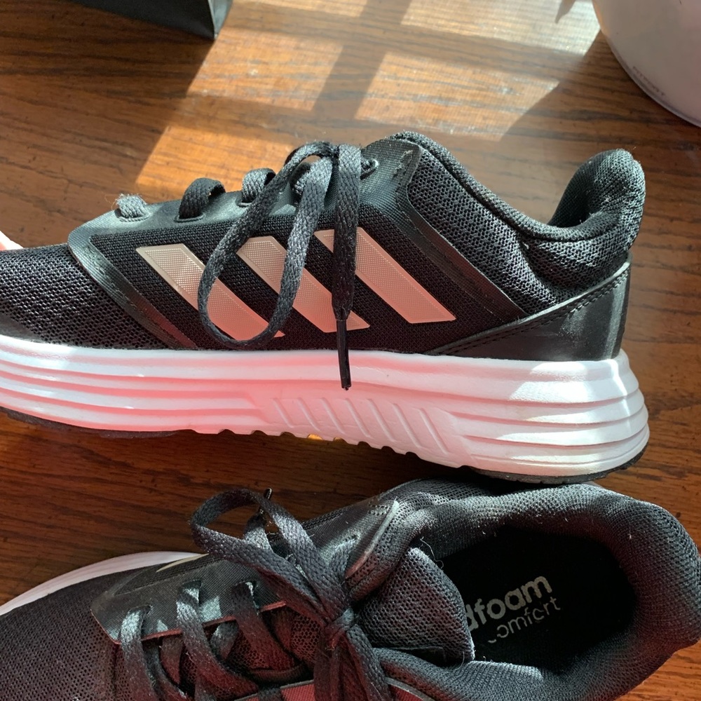 Adidas black shoes with brown Adida lines (only wore like 2 or 3 times)